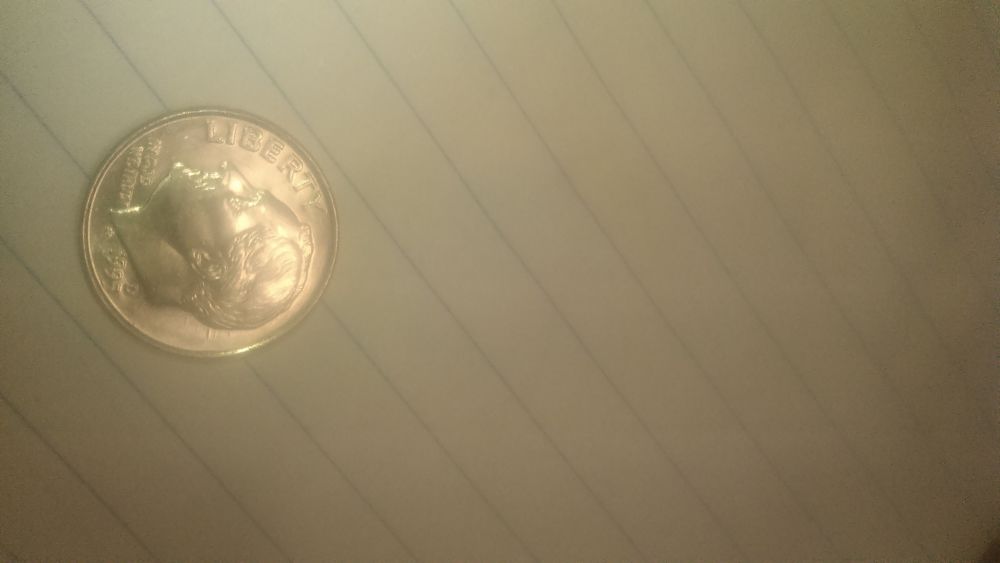1995-Dime-With-Curious-Marks-Behind-Roosevelt's-Head.